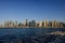 View of various skyscrapers in Jumeirah Beach Residence JBR with stunning waters as foreground