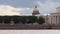 View of Vasilevsky island in Saint-Petersburg from Neva river. Isaak cathedral.