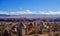 View of vast cemetery with mountains in the background