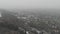 View of Vast Villa Neighborhood Next to Rural Forest. White Fog Day, Aerial