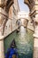 View of Venice canal and gondolas through the arch