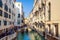 View of Venice canal Rio del Palazzo gondolas and crowded bridge Italy