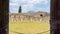 The view of Vesuvius from the Gladiators\' Barracks. Pompei, Campania, Italy, July 2020.