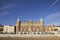 View of the Victorian Royal Hotel along the Esplanade promenade with a war memorial in