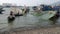 View of Vietnamese fishermen and his boat leaving the dockside, Da Nang