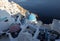 View from viewpoint of Oia village with blue dome of  greek orthodox Christian church