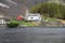 View of the village and the church on the shore of the fjord