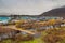 View of the village Esso, blue roofs houses, Kamchatka Peninsula, Russia.