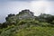 View on the village of FajÃ£ do Ouvidor, a permanent debris field, built from the collapsing cliffs on the northern coast of the