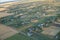 View of the village, fields and gardens from above.