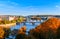 View of the Vltava River and Charle bridge with red foliage, Prague, Czech Republic