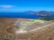 View of the volcanic crater and Lipari and Salina islands from the top of the volcano of the Vulcano island in the Aeolian islands