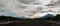 View of volcanoes: Ostry Tolbachik, Klyuchevskaya Sopka, Bezymianny, Kamen from river Studenaya at dawn. Kamchatka