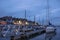 View of the Volendam harbor and yacht, boats and sailing boats anchored