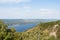 View of Volga riverbed, coastline and small town from top of the Zhiguli mountains