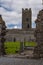 A view through a wall of the ruins of Clare Abbey a Augustinian monastery just outside Ennis, County Clare, Ireland that sits