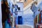 View of the walls with souvenirs in Medina in Chefchaouen, Morocco. The city is noted for its buildings in shades of blue and that