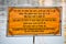 View of a warning sign board in the pond of golden temple shri Harmandir sahib in Amritsar