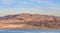 View of Washoe Valley and Lake, Nevada from the South with the Galena Arch bridge and rolling hills