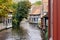 View of water canal and medieval buildings of Bruges