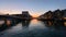 View from the water of the canal to the evening harbor of Nyhavn. Copenhagen, Denmark