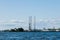 View from the water on the coastline of Kronstadt,cargo ships,Floating drilling rig,drilling cranes.Russia,Kronstadt,31