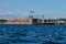 View from the water of the harbor and the parking of warships and submarines,the coastline of Kronstadt,the waters of