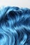View of wavy blue hair isolated