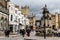 View of Wells Cathedral and market place fountain in Wells, Somerset, UK