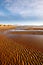 View of Welsh mountains from Newborough beach