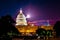 View of the west entrance of marble domed government building on Capitol Hill in Washington DC seat of Congress at nigh with