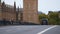 View of the Westminster bridge traffic near the Big Ben clock tower in London.