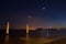 View of the wharf columns in square of commerce at moonrise, Lisbon Portugal Europe