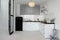 View on a white and black kitchen and black glass french door