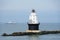 The view of the white and black lighthouse near Cape Henlopen, Lewes, Delaware, U.S