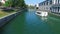 View of white boat floating on river in Ljubljana.