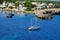 View on white boats, the beach and village Alcaufar on Menorca