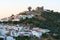 View of the white houses and the castle of the magical Andalusian town of Cortegana, Huelva, Spain