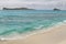 View of white sand beach of Gardner bay