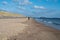 View on white sandy  beach, dunes and water of North sea between Vlissingen en Domburg, Zeeland, Netherlands