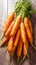 view Wholesome image vibrant carrots gathered in a bunch on wood