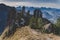 View of wild rocky mountains, high cliffs in Ammergau Alps near Schwangau. Hiking and climbing on the Tegelberg via the via ferrat