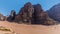 A view of wind eroded rocky outcrops in the desert landscape in Wadi Rum, Jordan