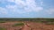 View of wind power turbines on blue sky background. Aruba,