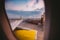 The view from the window of the airplane porthole at dawn at the airport of Barcelona. Theme of romance on a journey. Tourism and