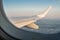 View through the window from the cabin of the aircraft. Sky scape view from clear glass window seat cabin crew to the aircraft