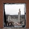 A view from the window on the natural landscape and the destroyed and burnt brick structure