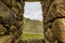 View through the window opening in the stone terraces