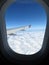 View from the window on the wing of the aircraft and stunningly beautiful clouds