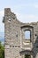 View through windows of ruin Castel Belfort in Italy